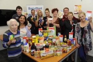 Staff dig in for food drive