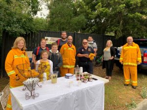 Siblings raise over $2000 for fire relief