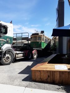 Historical tram arrives at restaurant in The Basin