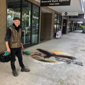 Local shopping strips lit up with local artist’s chalk work