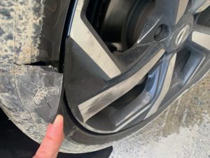 Potholes puncture tyres on Wellington Road